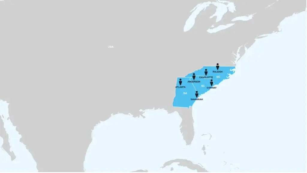 Gray map of United States with blue states and black location markers